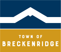 Town of Breckenridge logo with blue box that has a mountain outline and a gold sqaure